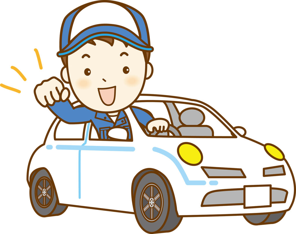 車に乗って点検する整備士